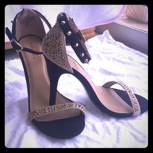 Heels Black&Tan w/studs. Only worn once(indoors).